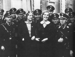 Smiling happy people all around? Nazi socialites, the Mitford Sisters Diana and Valkyrie (yes, really!), on the set of classic British TV comedy On the Buses sometime in the 1930s - I guess;)